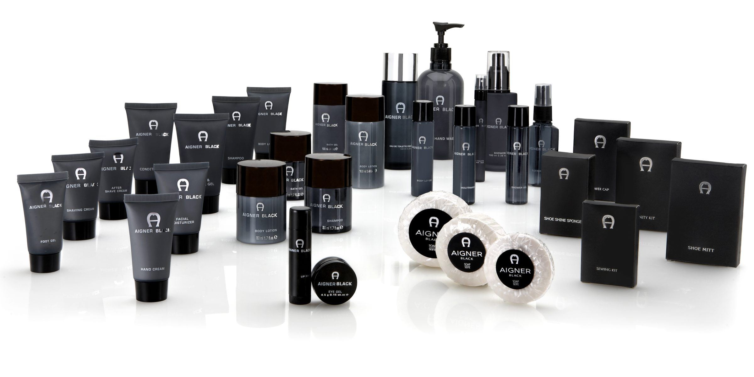 The Aigner Black amenity range — wet amenities, grooming products, dry amenities and vanity kits